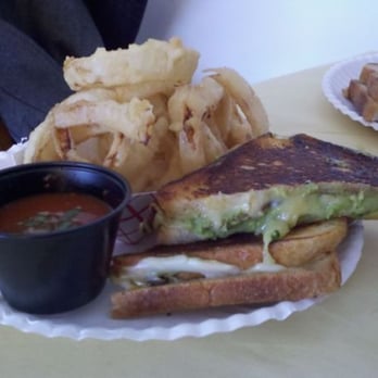Roxy's Gourmet Grilled Cheese - Green Muenster Grilled Cheese with Onion Rings - gooey goodness. - Sandwiches Near Me Roxy's Gourmet Grilled Cheese - Green Muenster Grilled Cheese with Onion Rings - gooey goodness. - Sandwiches Near Me