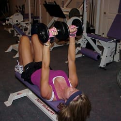Destiny Management - One of our clients performing dumbbell bench press.