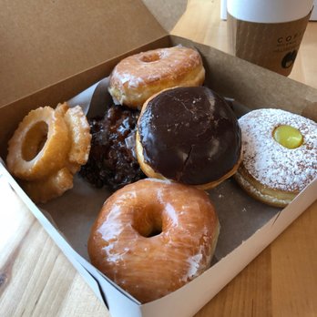 Early Bird Donuts - At 9 o'clock: old-fashioned 12 and 6: regular glazed 3 o'clock: lemon filled - Donuts Near Me - Durham, North Carolina