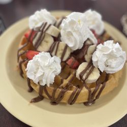 Strawberry, Banana, Nutella Waffle with fresh whipped cream 10/10!