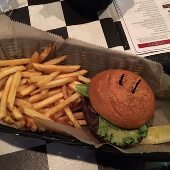 Nitty Gritty - Gluten Free Steakhouse Burger with gluten free fries and a pickle wedge - Bars Near Me - Madison, Wisconsin Nitty Gritty - Gluten Free Steakhouse Burger with gluten free fries and a pickle wedge - Bars Near Me - Madison, Wisconsin