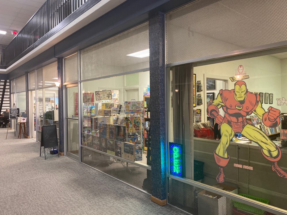 OtherWorld's Books & More Logo