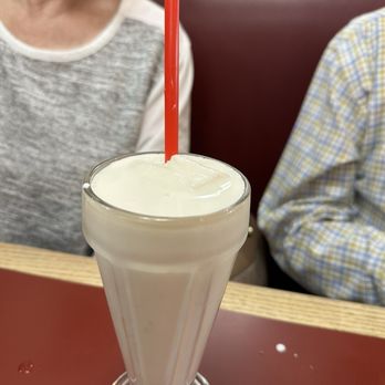 Mayberry Ice Cream - One of the 1/2 servings of the pineapple shake my parents split after lunch, server split it for them in 2 glasses. Sept 2024 - Ice Cream & Frozen Yogurt Near Me - Winston Salem, North Carolina