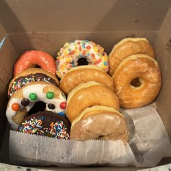 Dk Donuts & Burgers - National donut day!! All I can say is amazing!!! As you can see 2 glazed we're gone before we even got home lol