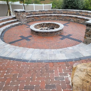 Live Aloha Landscapes - a brick patio with a fire pit - Landscape Architects or Designers Near Me Live Aloha Landscapes - a brick patio with a fire pit - Landscape Architects or Designers Near Me