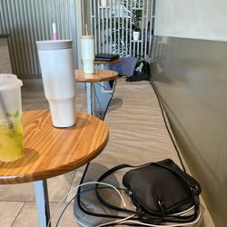 Kiwi Cup - Staff bags littering the seating area.