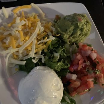 Iron Cactus San Antonio - The fajita fixings - Mexican Near Me - San Antonio, Texas