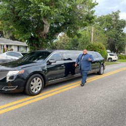 Orlando Chauffeured Services - Our amazing driver, Justin, and the beautiful limousine.