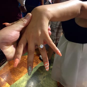 Ultimate Diamond - She said yes at the Top of the Rock - Jewelry Near Me - New York, New York