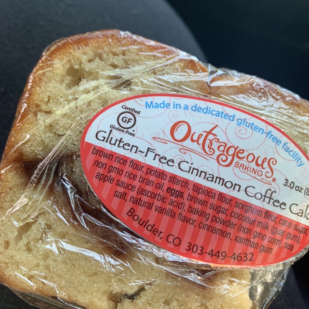 a sandwich wrapped in plastic a sandwich wrapped in plastic