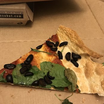 Pizza Hut - a slice of pizza with olives and spinach - Pizza Near Me - Florence, Alabama Pizza Hut - a slice of pizza with olives and spinach - Pizza Near Me - Florence, Alabama