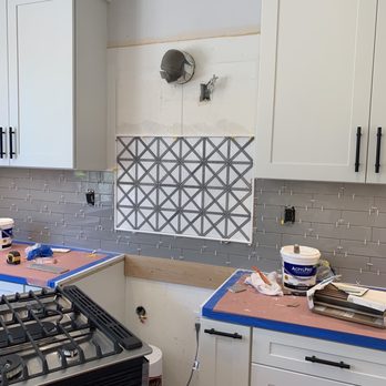 Jorge's Tiling - They made sure to cover all of our countertops and out everything back as it was. - Tiling Near Me