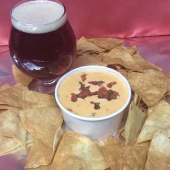 Treehouse BBQ - Chips and Sriracha beer queso - Food Trucks Near Me - Colorado Springs, Colorado Treehouse BBQ - Chips and Sriracha beer queso - Food Trucks Near Me - Colorado Springs, Colorado