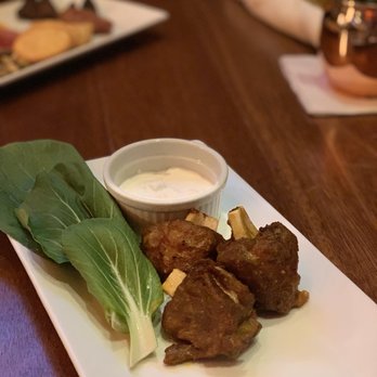 Smitty's Study Pub - Pork wings with tahini sauce - Pubs Near Me - Madison, Wisconsin