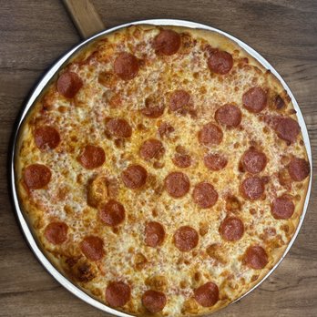 Flame Pizzeria - a pepperoni pizza - Pizza Near Me - Orlando, Florida Flame Pizzeria - a pepperoni pizza - Pizza Near Me - Orlando, Florida