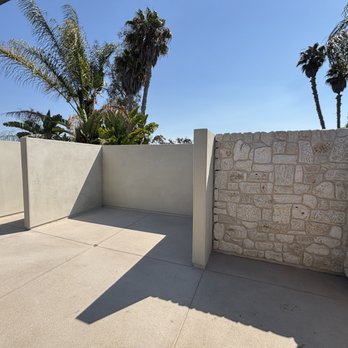 Genesis California - Beautiful stucco and stone walls for trash enclosed and storage area - Solar Installation Near Me Genesis California - Beautiful stucco and stone walls for trash enclosed and storage area - Solar Installation Near Me