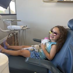 Dodds Dental - Doc got glasses to match her shoes!