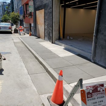 AC Contracting - an orange cone on the sidewalk - General Contractors Near Me - San Francisco, California