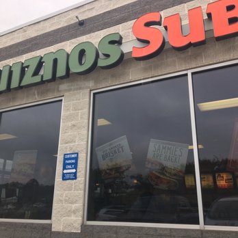 Quiznos - the outside of a restaurant with a sign on the front of the building - Sandwiches Near Me - Belmont, Ohio Quiznos - the outside of a restaurant with a sign on the front of the building - Sandwiches Near Me - Belmont, Ohio