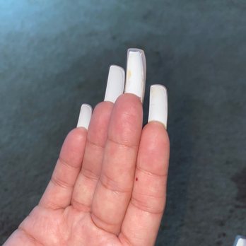 Nail Bar - Mountain View - Unprofessional and poor repair on middle finger nail - Nail Salons Near Me - Mountain View, California