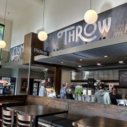 Stone's Throw Coffee & Market - Some of the interior seating and the barista counter