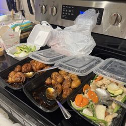 Panda Garden - (left to right) orange chicken, sesame chicken, moo goo gai pan
