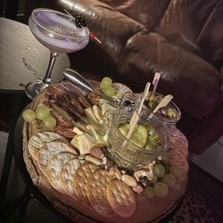 Phelanies - Charcuterie board and a Pink Lady Cocktail.