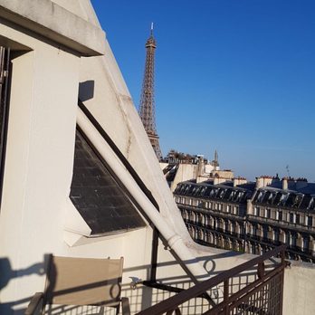 Maison FL - Peek a boo view of the Eiffel Tower from our balcony patio - Hotels Near Me - Paris, 75