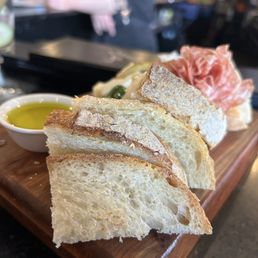 Charcuterie and House Bread with Basil Oil
