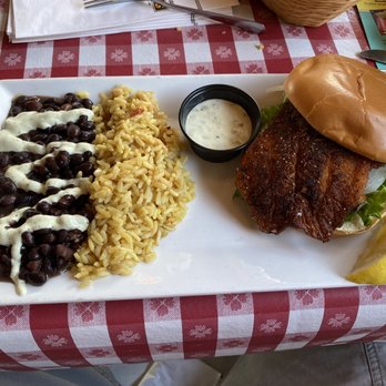 Conchy Joe's - Tripletail blackend with yellow rice and black beans - Seafood Near Me - Jensen Beach, Florida Conchy Joe's - Tripletail blackend with yellow rice and black beans - Seafood Near Me - Jensen Beach, Florida