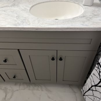 Re-Bath - a white sink and marble countertop - Kitchen & Bath Near Me - Las Vegas, Nevada