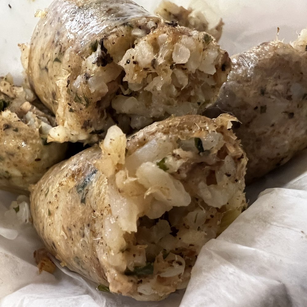 Hollier's Cajun Kitchen - a close up of a burrito - Cajun/Creole Near Me - Sulphur, Louisiana Hollier's Cajun Kitchen - a close up of a burrito - Cajun/Creole Near Me - Sulphur, Louisiana