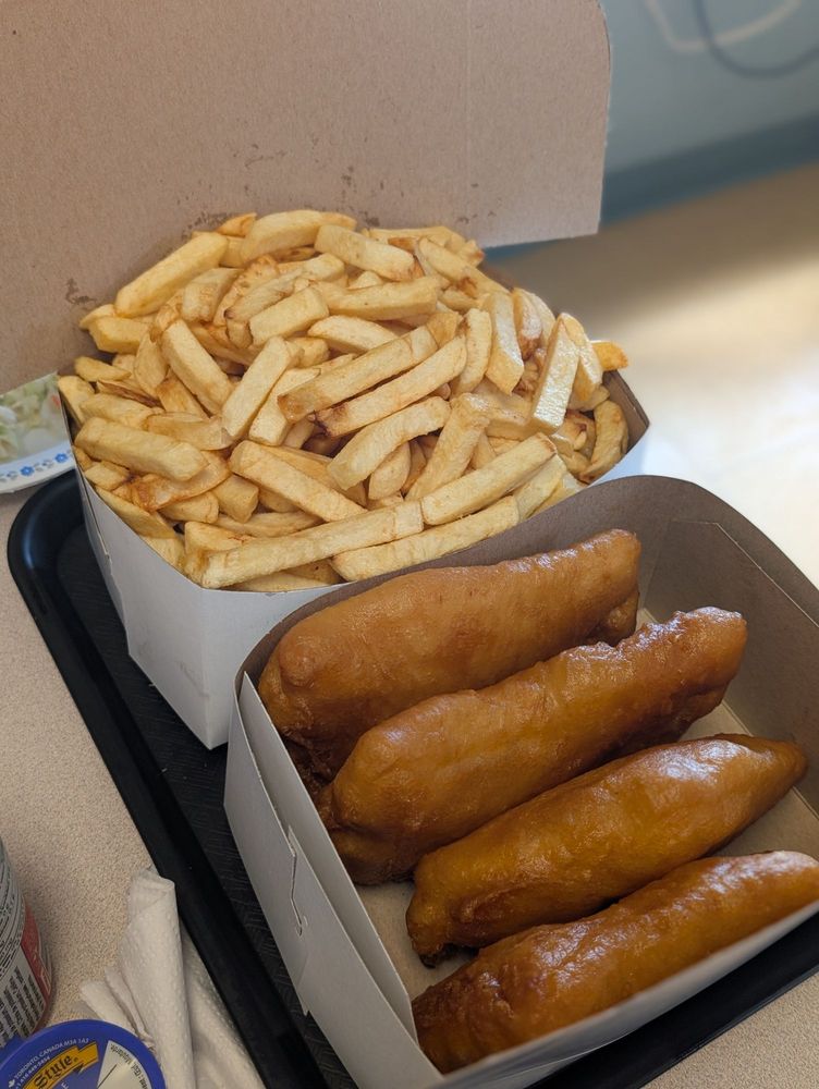 Terry's Fish & Chips Seafood Grill Logo