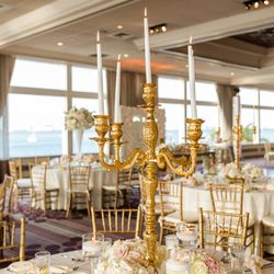 Tres Chic Event Planning & Design - Candelabra centerpieces with Ivory, blush and neutral tones wedding reception
