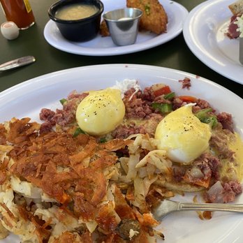 Milton's - Corned Beef Hash Breakfast with medium poached eggs (they were perfect) and Potato Pancakes (2) with apple sauce and sour cream. - Delis Near Me - Del Mar, California Milton's - Corned Beef Hash Breakfast with medium poached eggs (they were perfect) and Potato Pancakes (2) with apple sauce and sour cream. - Delis Near Me - Del Mar, California