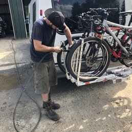 Swann Tire helping us get our lock off our bikes because we lost the key. Super friendly and awesome service. Thanks Swann!!
