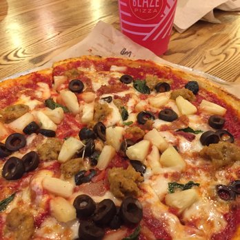 Blaze Pizza - Pineapple, extra red sauce, black olives, fresh basil, easy on the mozzarella, bacon and sausage, baked to perfection! - Pizza Near Me - Hawthorne, California Blaze Pizza - Pineapple, extra red sauce, black olives, fresh basil, easy on the mozzarella, bacon and sausage, baked to perfection! - Pizza Near Me - Hawthorne, California