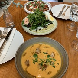 Pumpkin soup, Niçoise salad, flat bread