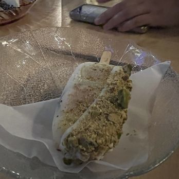 Pancita - Paleta: Arroz con leche with 2 types of figs, pistachios, and white chocolate. - Mexican Near Me - Seattle, Washington Pancita - Paleta: Arroz con leche with 2 types of figs, pistachios, and white chocolate. - Mexican Near Me - Seattle, Washington