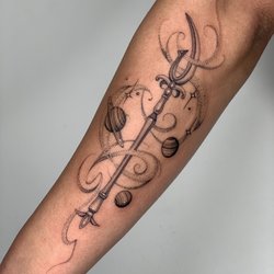 Left exterior forearm: sailor Saturn silence death glaive tattoo. Done by the talented and amazing Brittney!