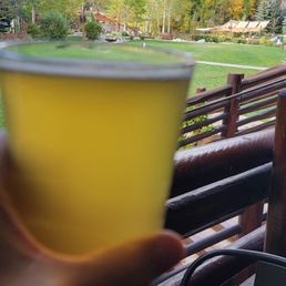 Mangy Moose Local Brew with outside view of Mt Rendezvous