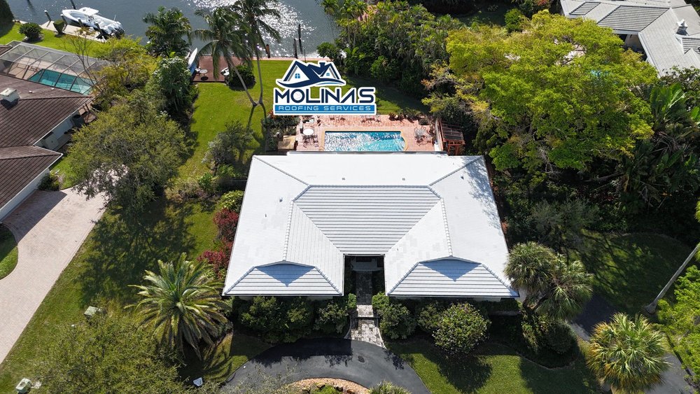 Slide of Molina's Roofing Services