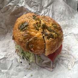 Jalapeño cheddar bagel with hummus and veggies Jalapeño cheddar bagel with hummus and veggies