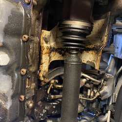 RT 82 Auto Gallery - Oil dumping out of the back of the engine after they removed the heads and cleaned injectors.