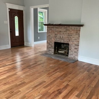 MAG Development - New Hardwood Floors and Fresh Paint and Trim - General Contractors Near Me