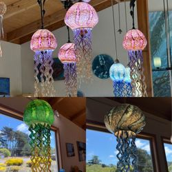 Glass Fire Gallery - Beautiful blown glass art including these jellyfish.
