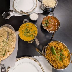 Spice Garden - Garlic Naan, Butter chicken, Shrimp biryani (sp?) Lamb vindaloo