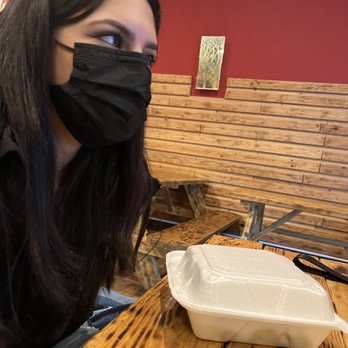 Chops - my friend priyanki eating a bulgolgi burrito - Asian Fusion Near Me - Lynnwood, Washington Chops - my friend priyanki eating a bulgolgi burrito - Asian Fusion Near Me - Lynnwood, Washington
