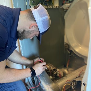 Appliance Professional - Diagnosing a dryer for repair. - Appliances & Repair Near Me - Lexington, South Carolina