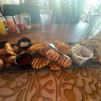 The Spot - Seafood Platter - Shrimp Kisses, Jumbo Fried Shrimp, Coconut Shrimp, Beer-battered fish, and Fish Filet - Burgers Near Me - Galveston, Texas The Spot - Seafood Platter - Shrimp Kisses, Jumbo Fried Shrimp, Coconut Shrimp, Beer-battered fish, and Fish Filet - Burgers Near Me - Galveston, Texas